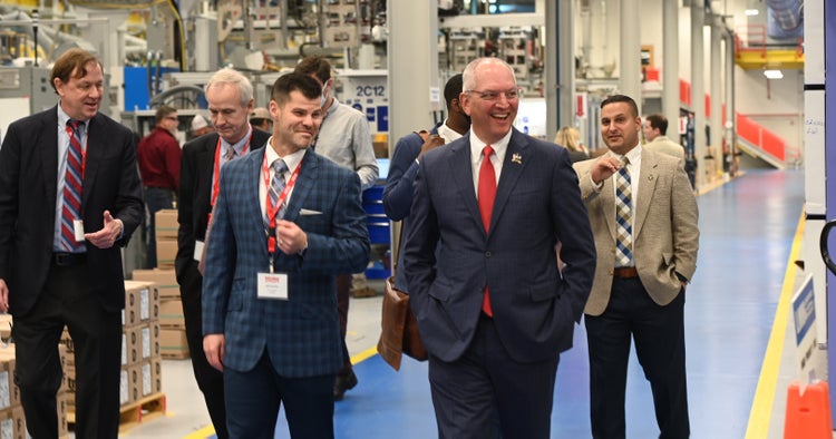 Governor John Bel Edwards of Louisiana tours Intralox's Hammond facility with Intralox personnel