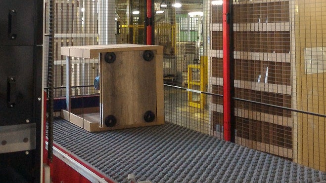 Furniture crate on DARB 90-degree transfer conveyor