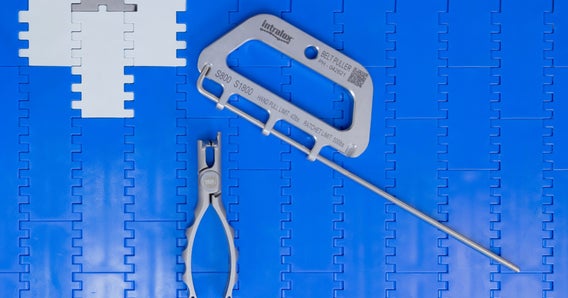 Intralox Rod Remover, Belt Puller, and Clean Release tools on blue conveyor belt