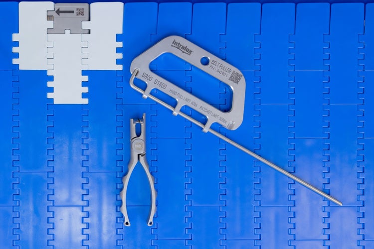 Intralox Rod Remover, Belt Puller, and Clean Release tools on blue conveyor belt