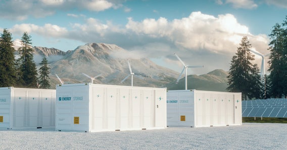 Grandes unidades de armazenamento de energia à base de bateria, juntamente com painéis solares e turbinas eólicas