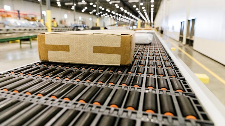 Short taped cardboard box on ARB conveyor