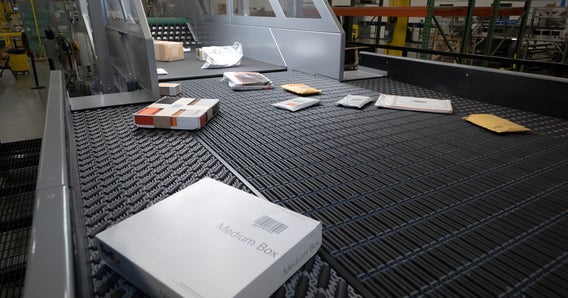 Envelopes and boxes on Intralox Smart Singulator