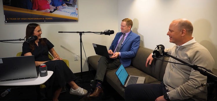 individuals participating in a podcast