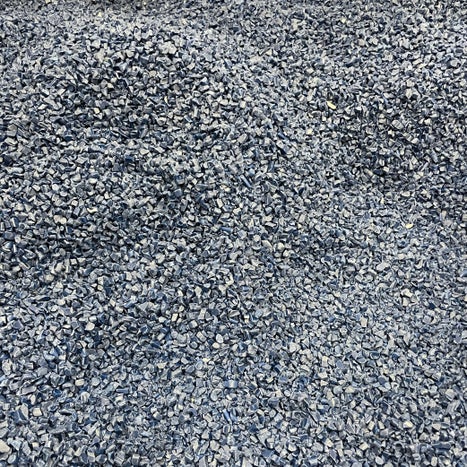 Small pieces of acetal belt regrind