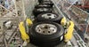 Tires on roller top accumulation conveyor belts