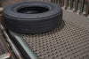 Tire on ARB conveyor belt