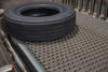 Tire on ARB conveyor belt