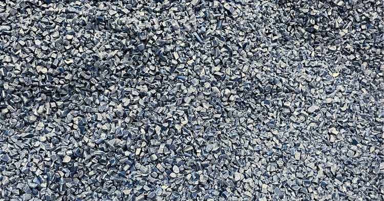 Small plastic pieces being processed for recycling