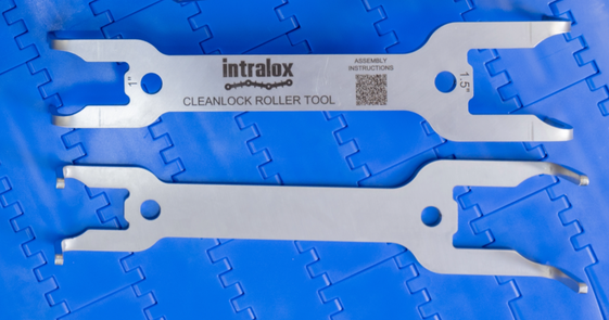 Two CleanLock Roller Tools on blue conveyor belt