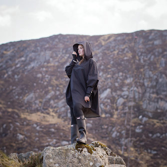 Woman standing on rock