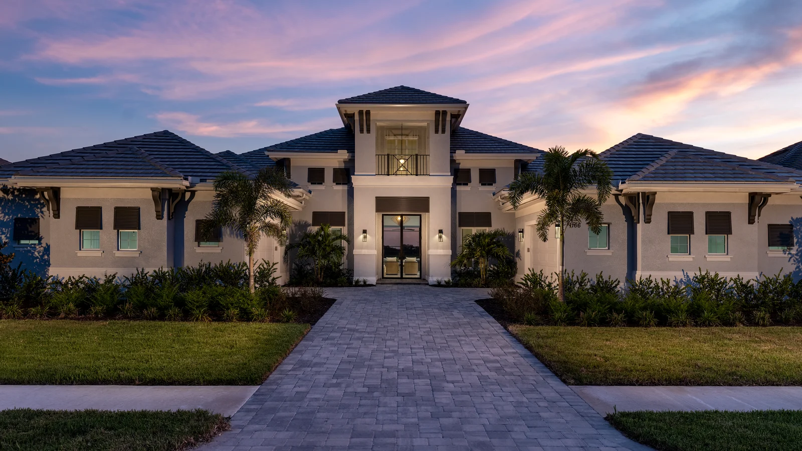 SEVEN DESIGNER-DECORATED MODEL HOMES SOLD IN WILD BLUE AT WATERSIDE