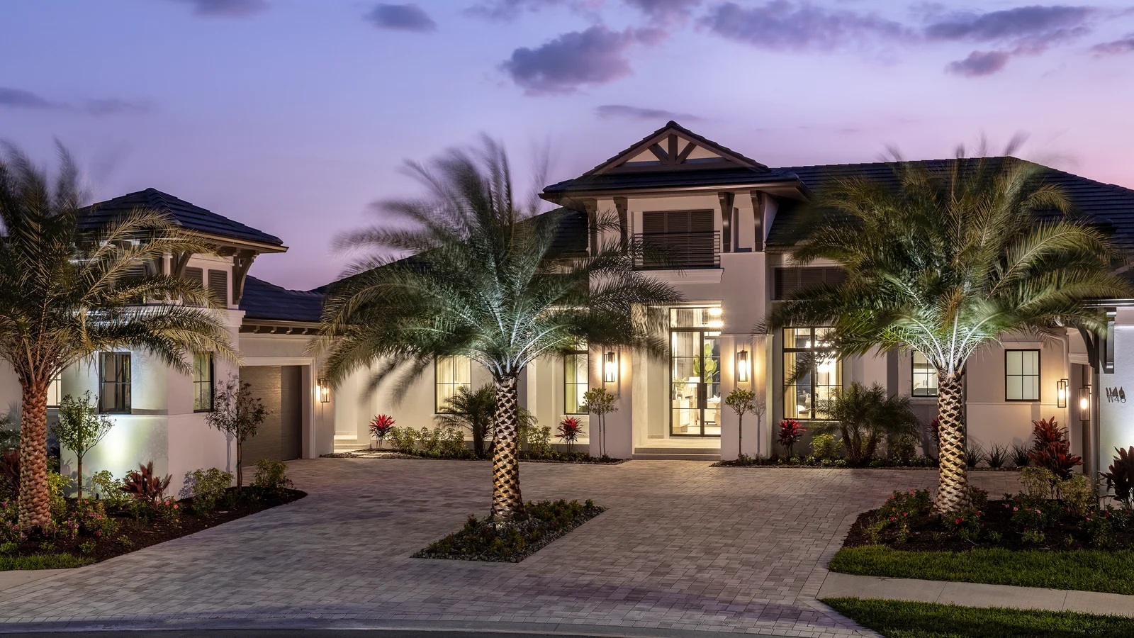 STOCK CUSTOM HOMES CELEBRATES LANDMARK SALE IN WILD BLUE AT WATERSIDE
