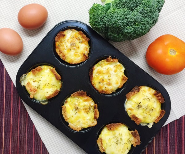 Savory items cooked in a black non-stick tray