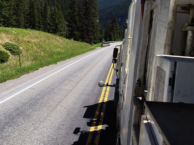 Truck applying markings to a roadway. Extended Season Traffic Paint