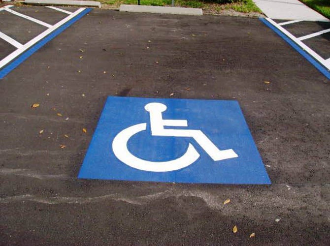 Wheelchair accessible pavement marking