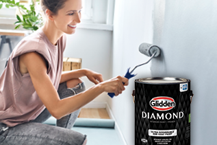 DIYer Painting with PPG Glidden Diamond Paint