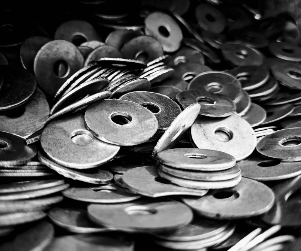 Close up of a pile of silver washers