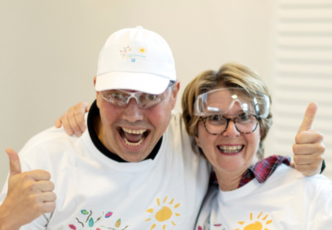 Guy and girl enthusiastic about volunteering 