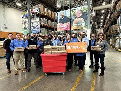 Smithfield employees joined together at the Northern Illinois Food Bank to donate 130,000 servings of pork to their neighbors in need.