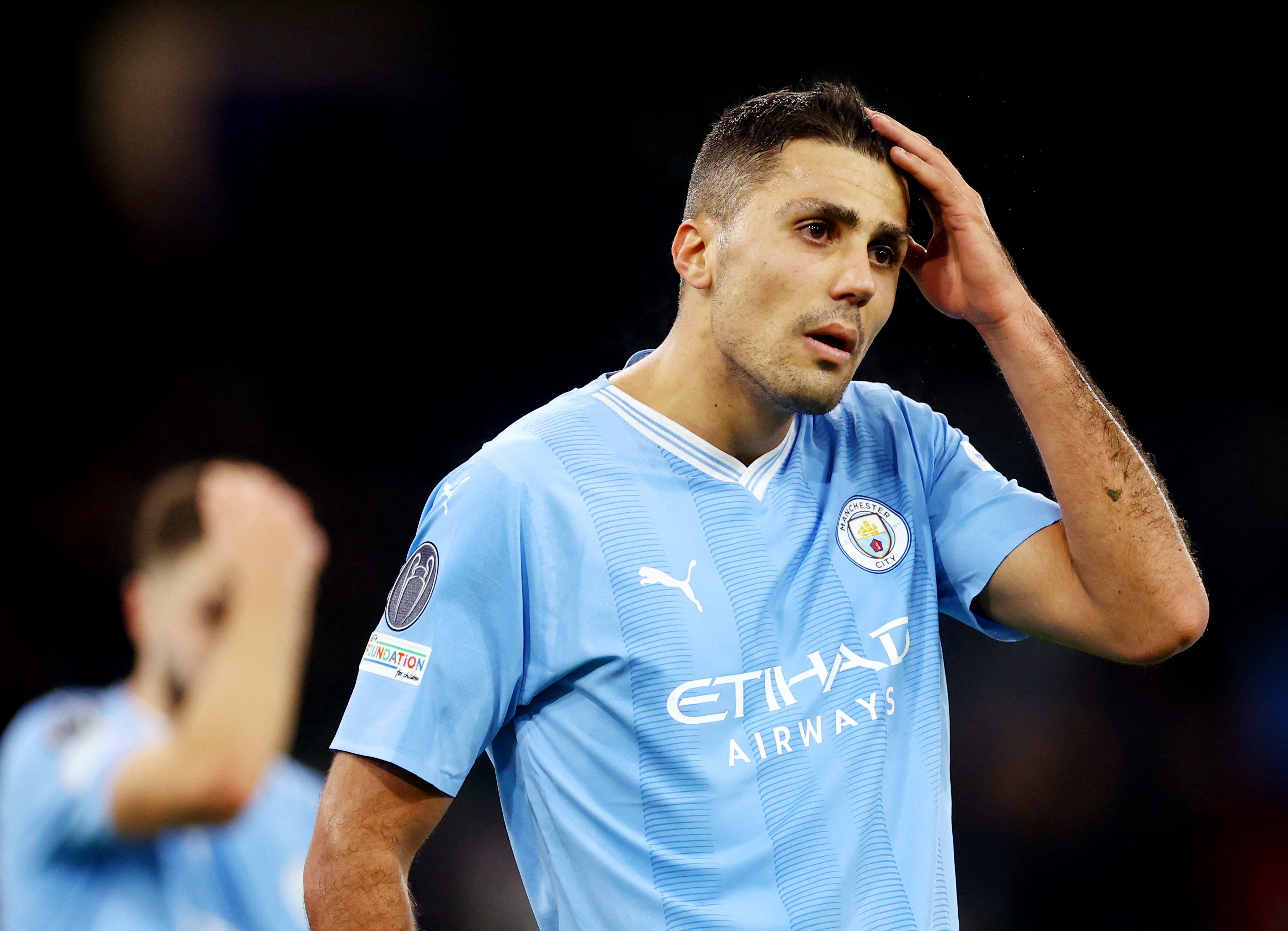 Rodri playing for Manchester City.