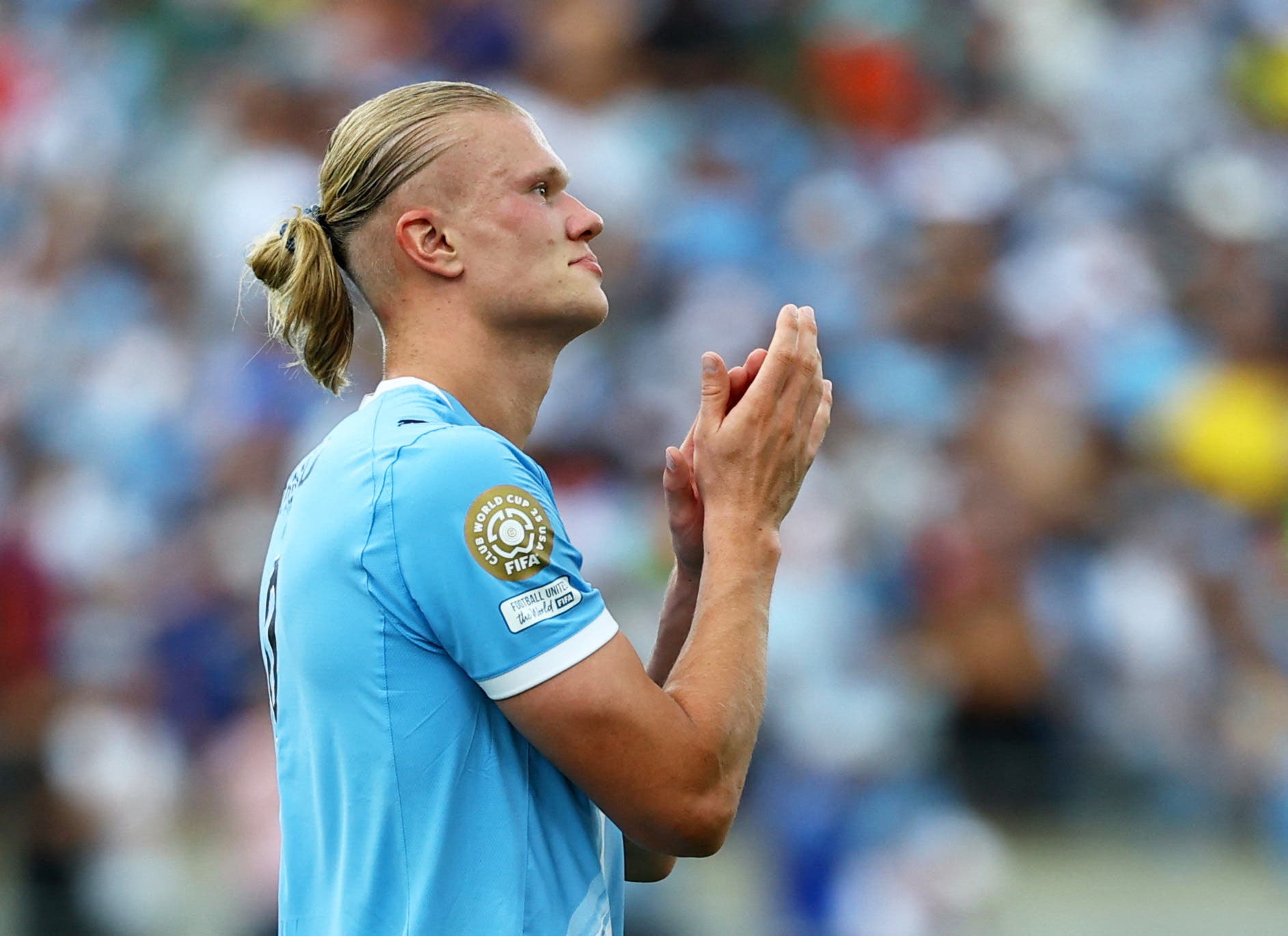 Erling Haaland celebrates a goal with Manchester City.