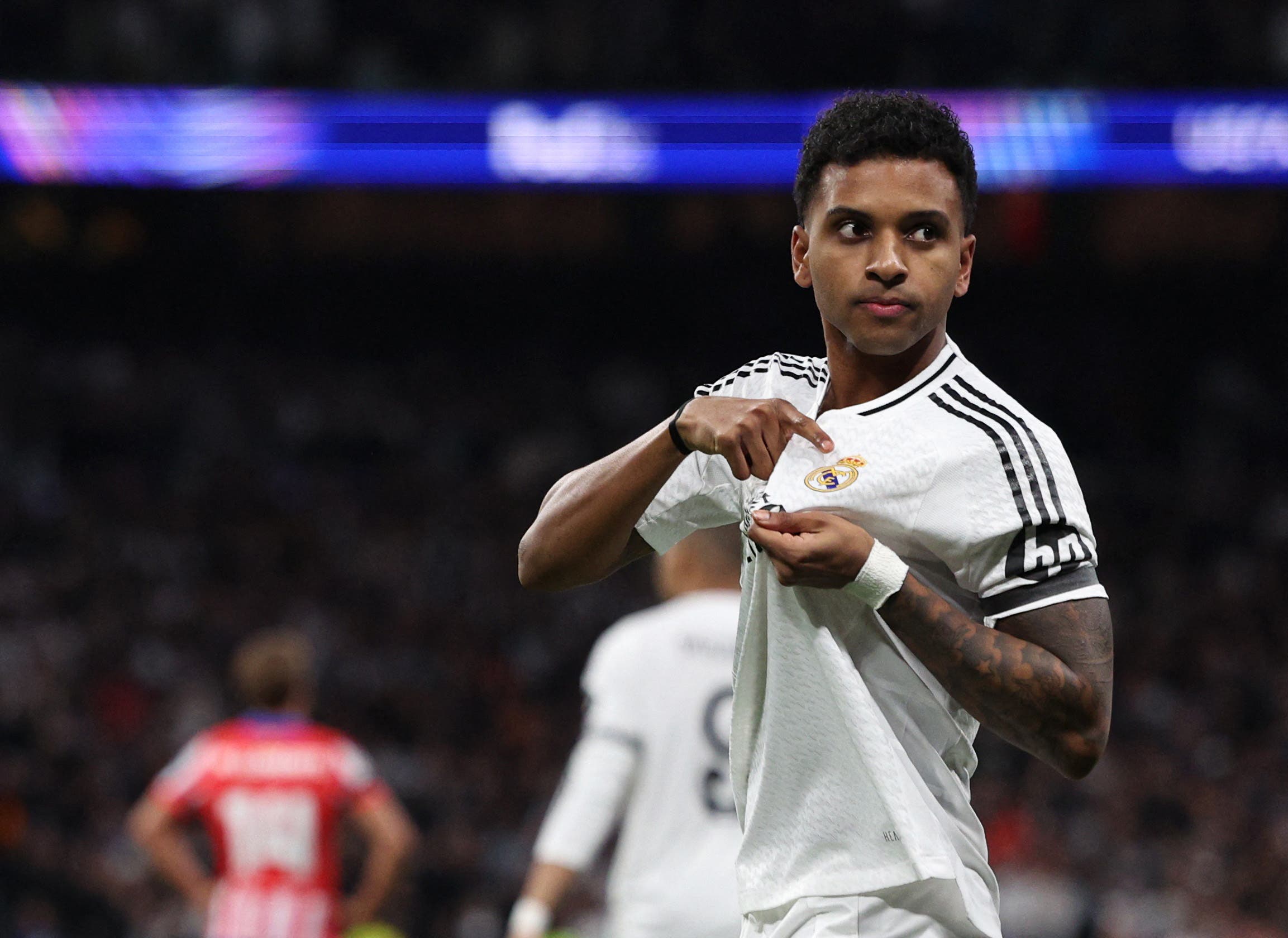 Real Madrid's Rodrygo celebrates scoring their first goal 