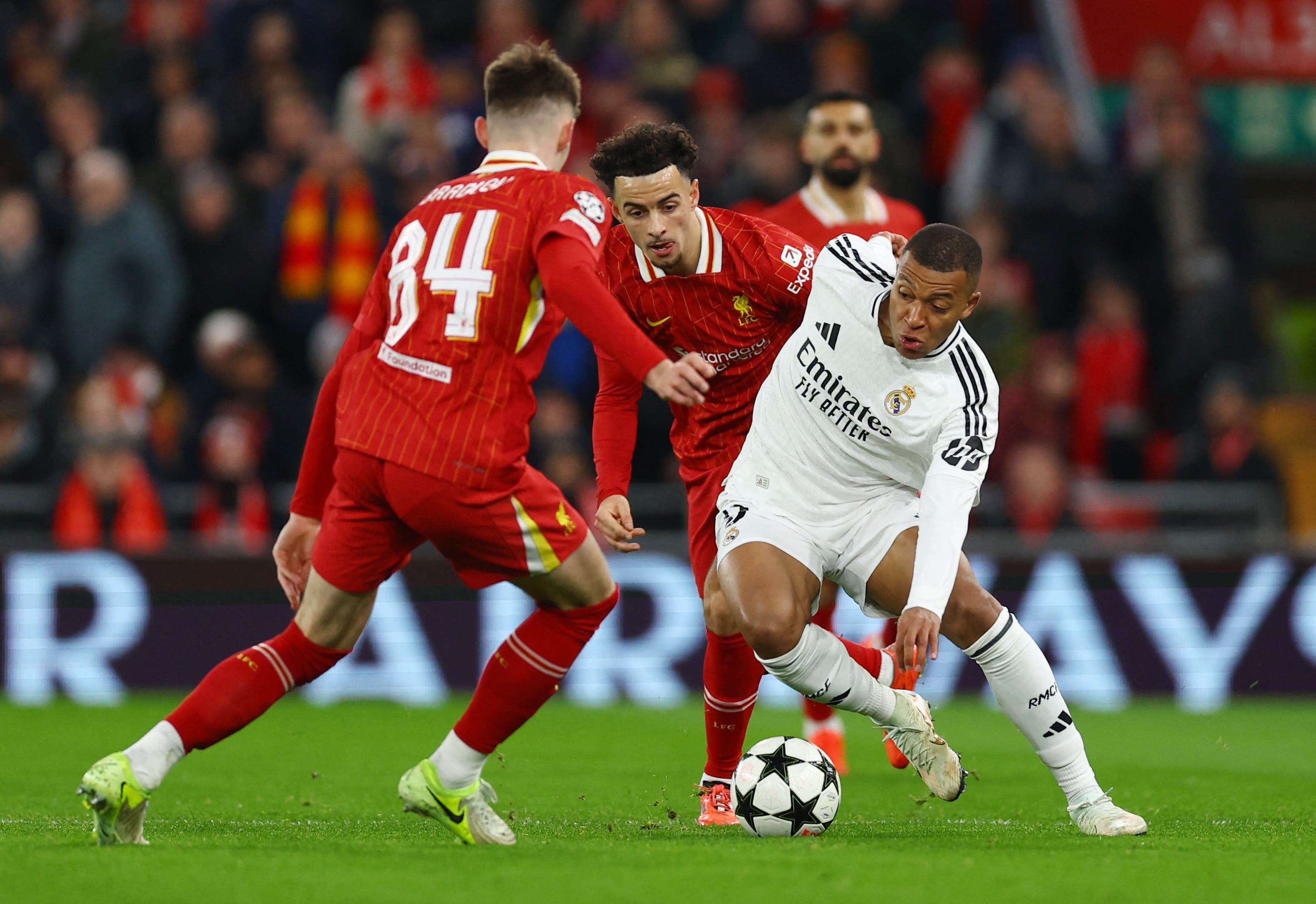 Conor Bradley and Kylian Mbappe in Liverpool v. Real Madrid.