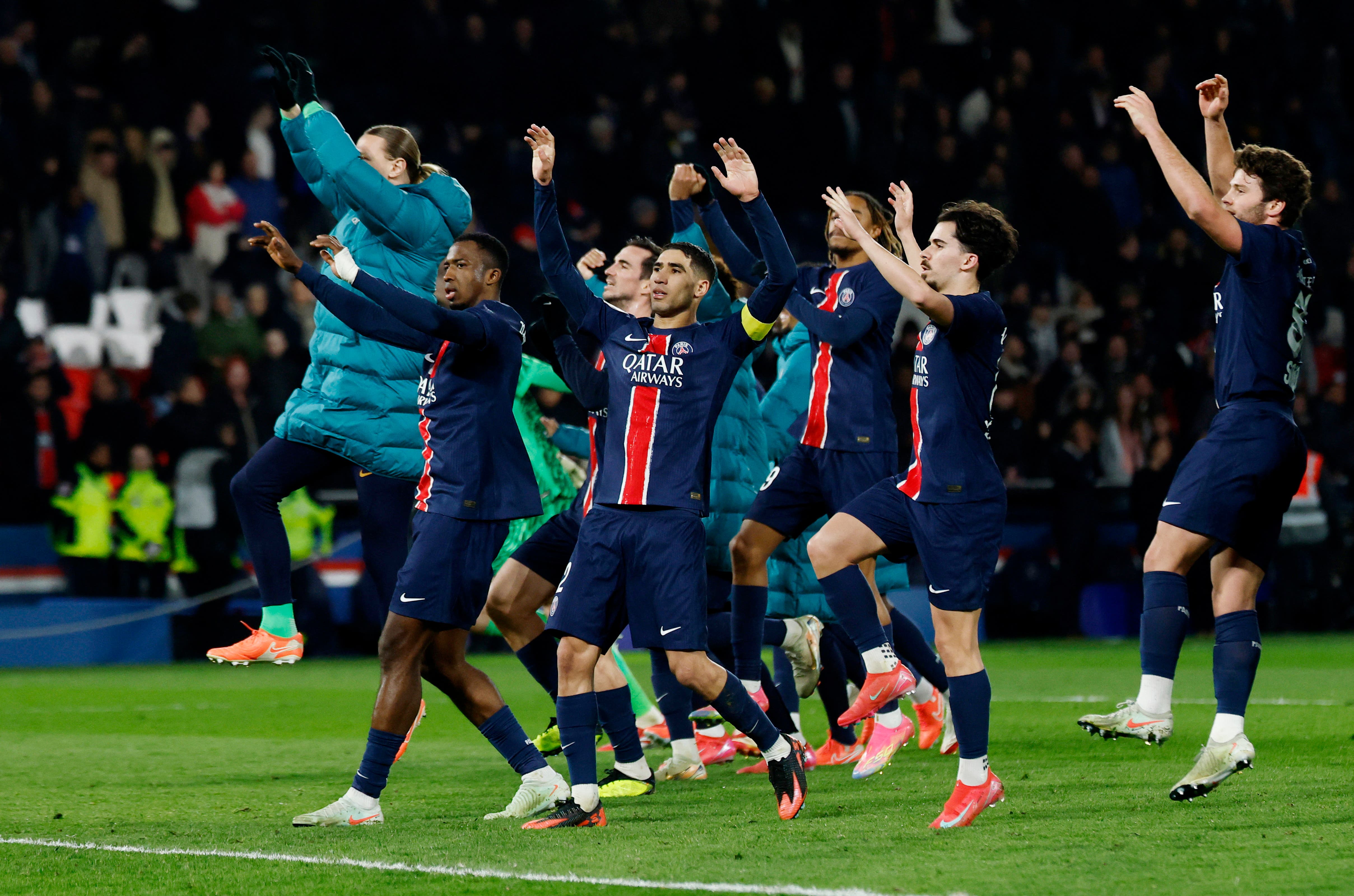 Paris St Germain players celebrate after the match