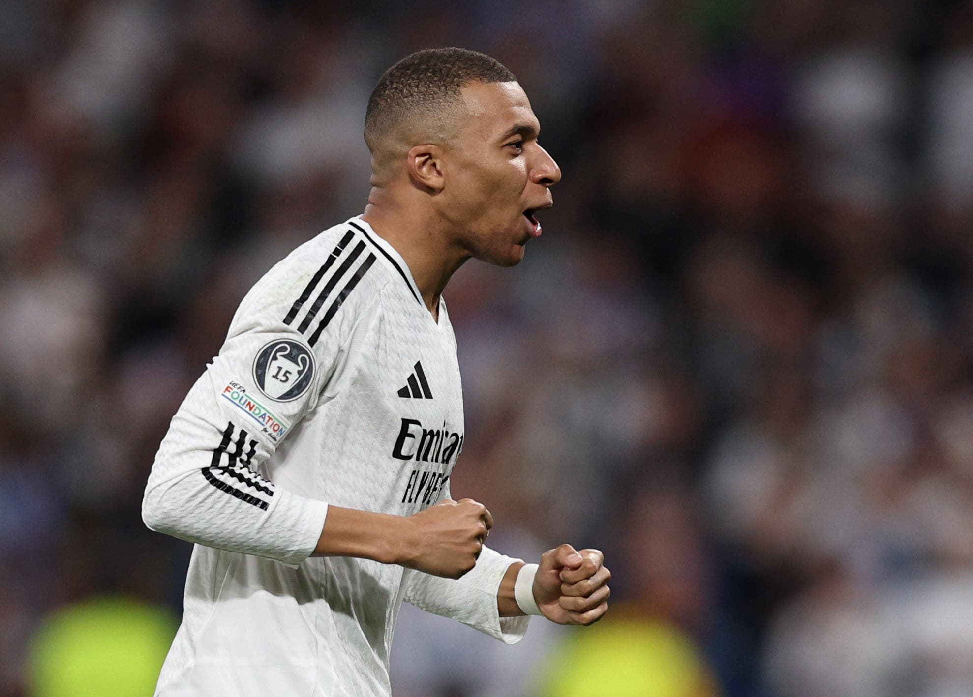 Kylian Mbappé celebrating his hat-trick against Manchester City.