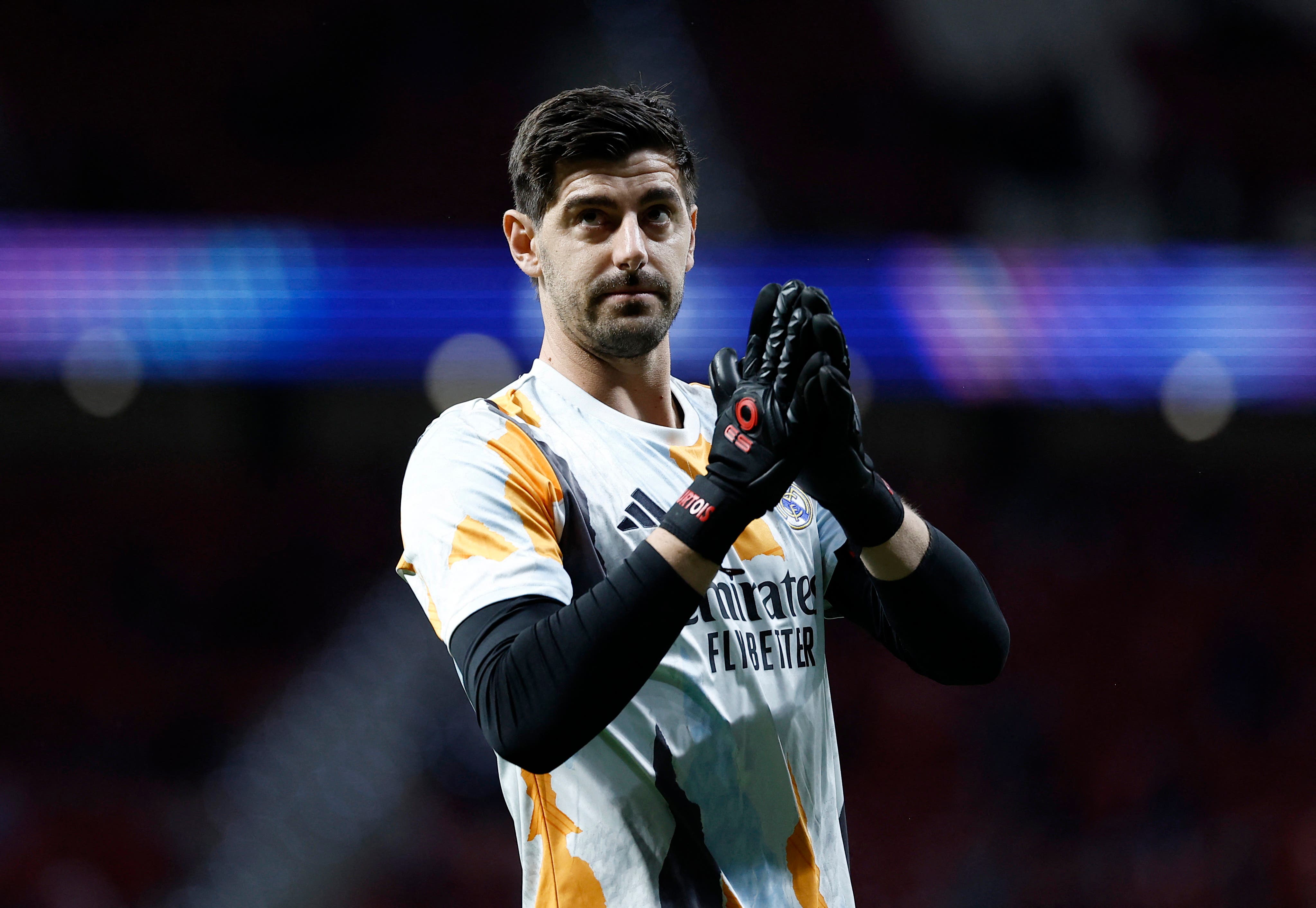 Soccer Football - Champions League - Round of 16 - Second Leg - Atletico Madrid v Real Madrid - Metropolitano, Madrid, Spain - March 12, 2025 Real Madrid's Thibaut Courtois during the warm up before the match REUTERS/Juan Medina
