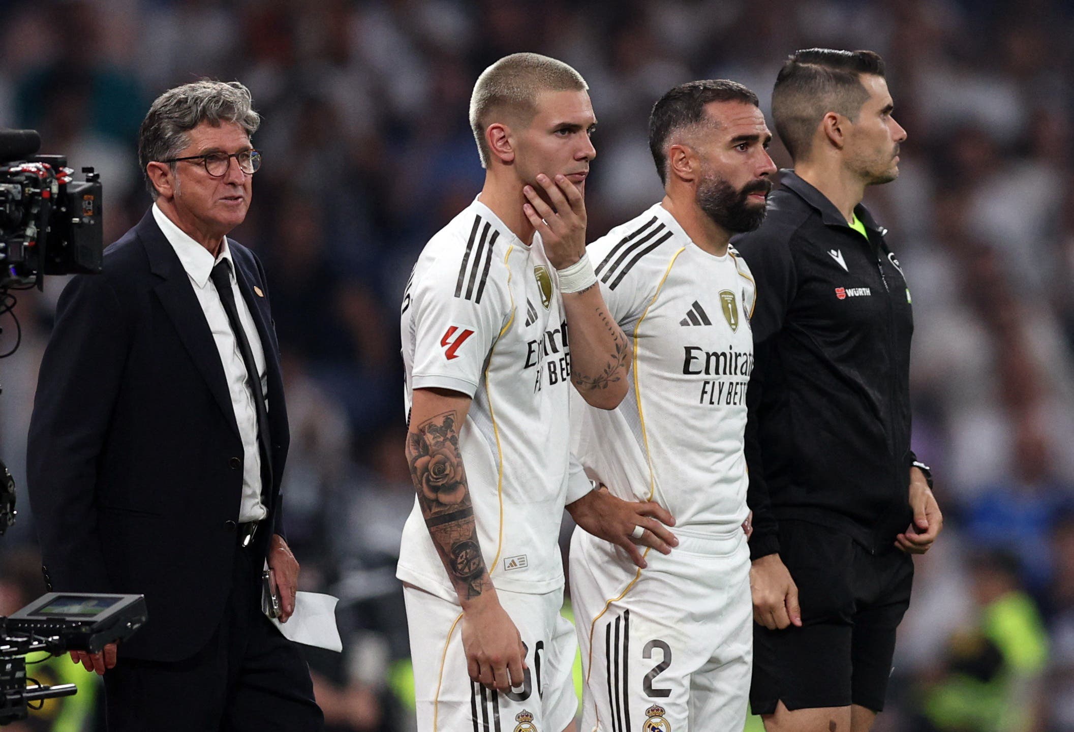 Franco Mastantuono and Dani Carvajal prepare to enter a match with Real Madrid.