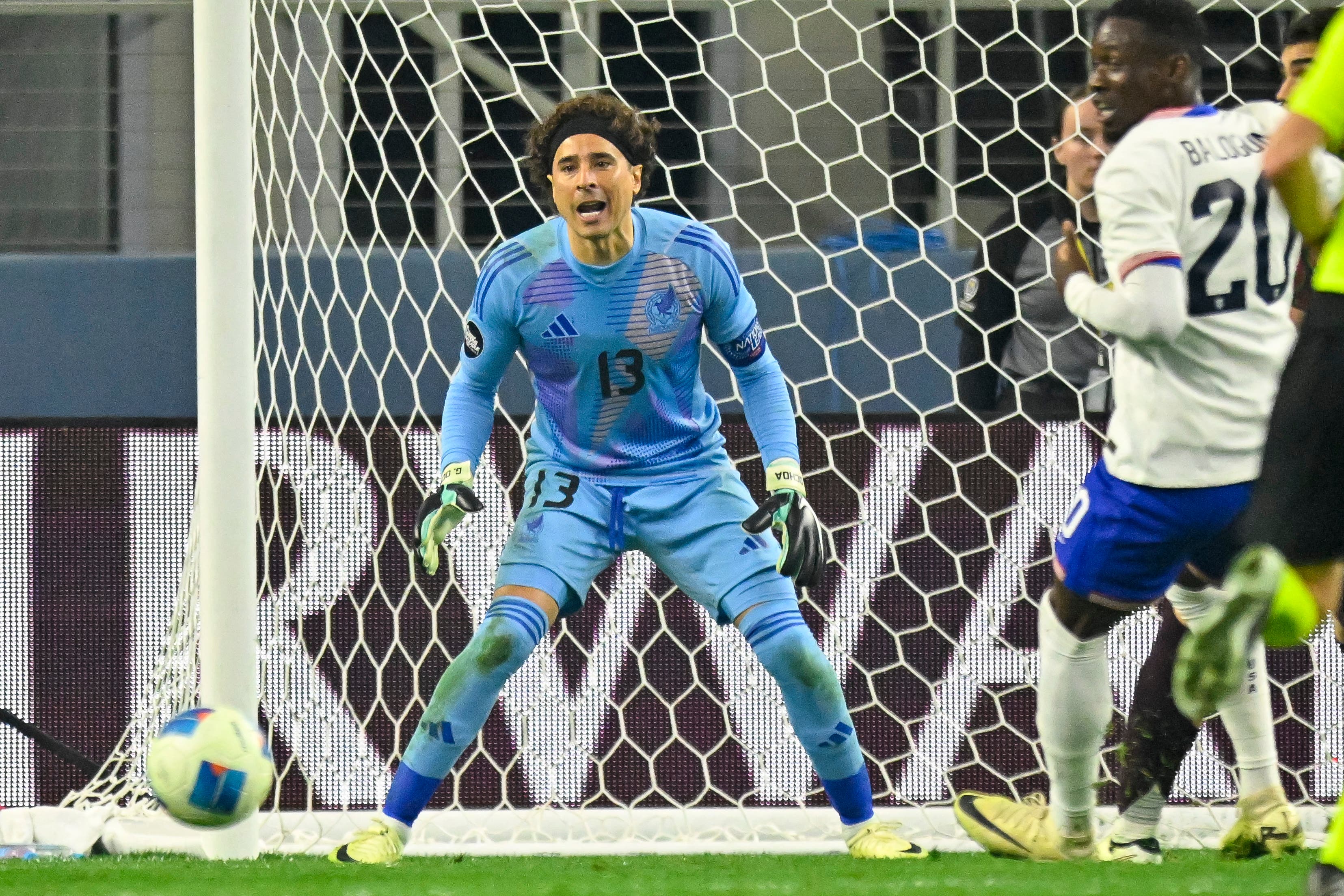 Mar 24, 2024; Arlington, Texas, USA; Mexico goalkeeper Guillermo Ochoa (13) faces the United States attack during the second half at AT&T Stadium. Mandatory Credit: Jerome Miron-USA TODAY Sports
