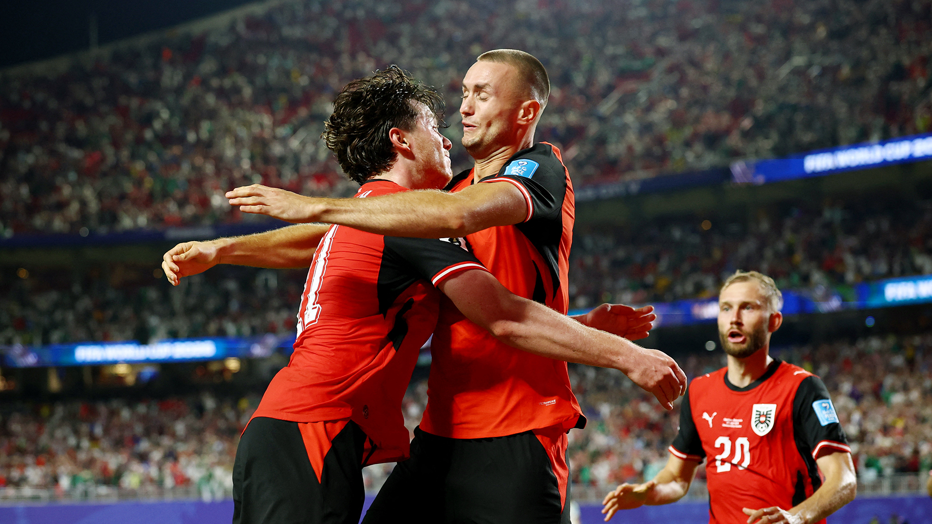 Soccer Football - FIFA World Cup 2026 - Group J - Algeria v Austria - Kansas City Stadium, Kansas City, Missouri, U.S. - June 27, 2026 Austria's Sasa Kalajdzic celebrates scoring their third goal with Michael Gregoritsch REUTERS/Phil Noble