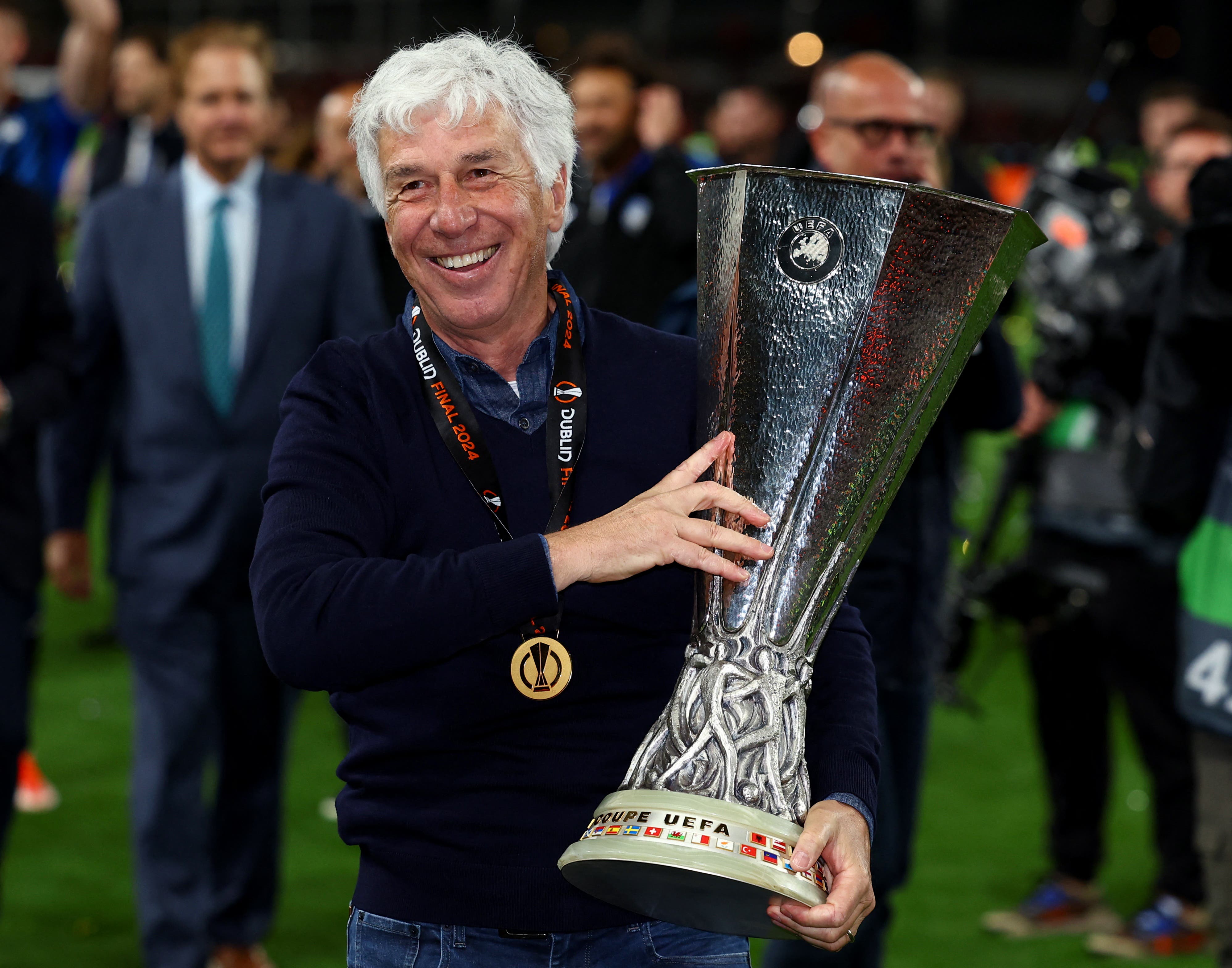 Gasperini poses after winning the UEFA Europa League with Atalanta