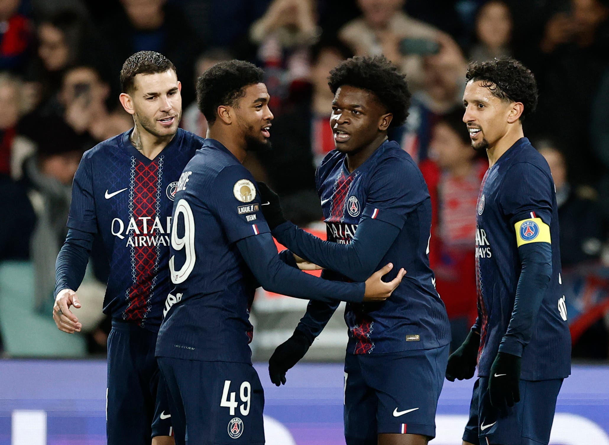 Soccer Football - Ligue 1 - Paris St Germain v Stade Rennes - Parc des Princes, Paris, France - December 6, 2025 Paris St Germain's Ibrahim Mbaye celebrates scoring their fourth goal with teammates REUTERS/Benoit Tessier