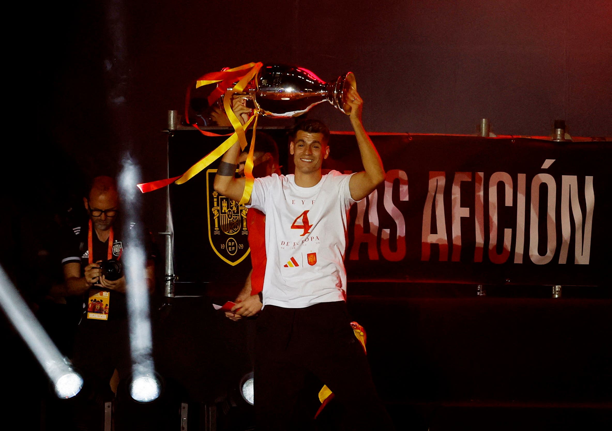 Alvaro Morata lifting the EURO 2024 trophy at Spain's Parade