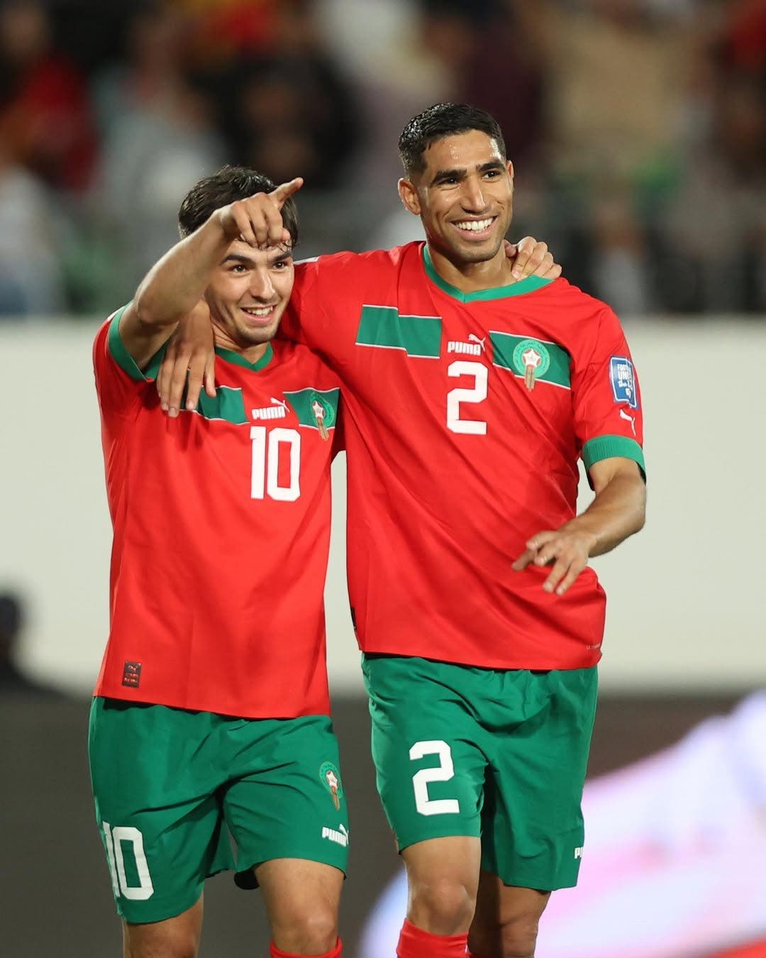 Brahim Díaz and Achraf Hakimi celebrate a goal during a match with Morocco National Team.