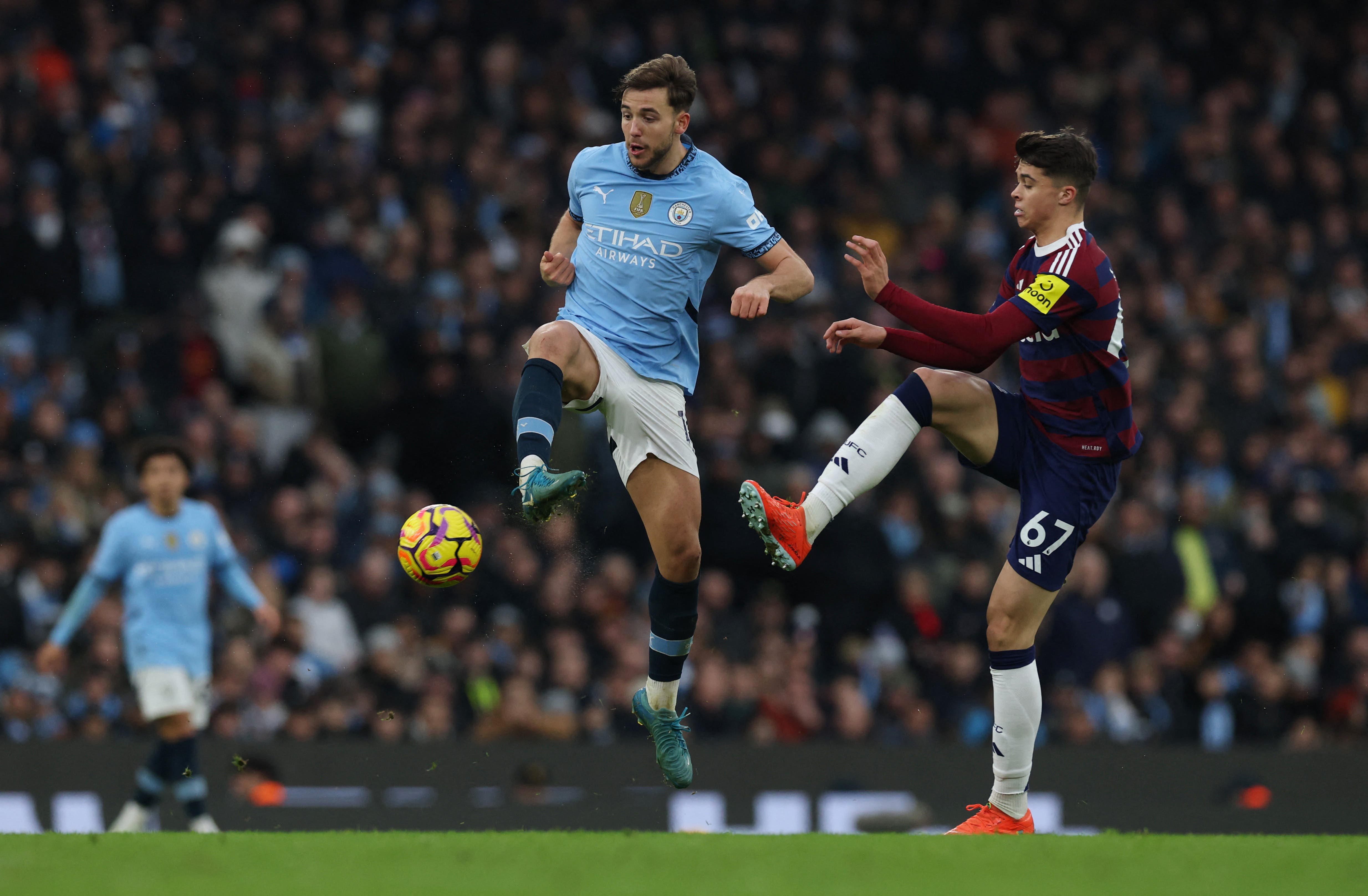 Manchester City's Nicolas Gonzalez in action with Newcastle United's