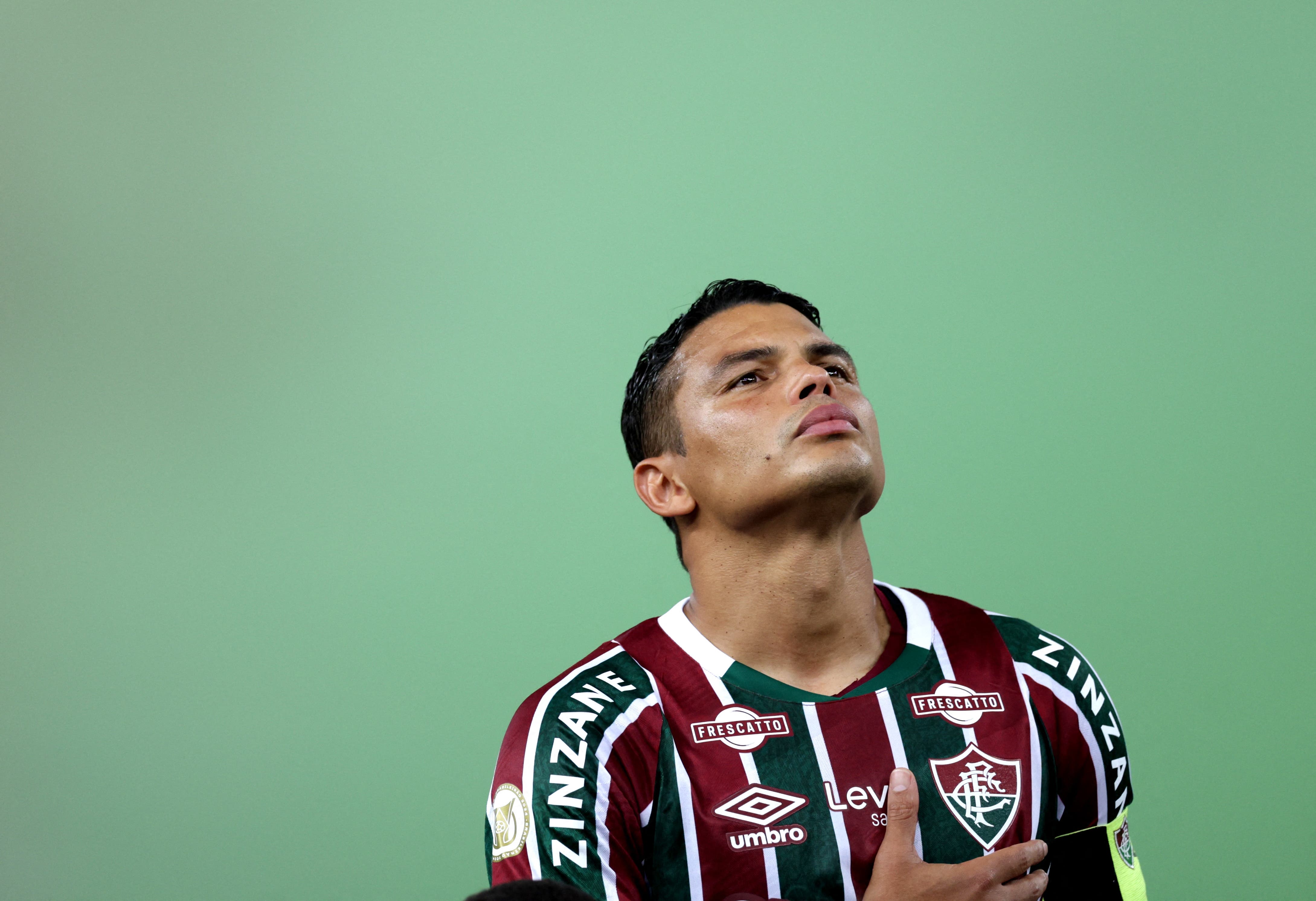 Thiago Silva with Fluminense listening Brazil's National Anthem