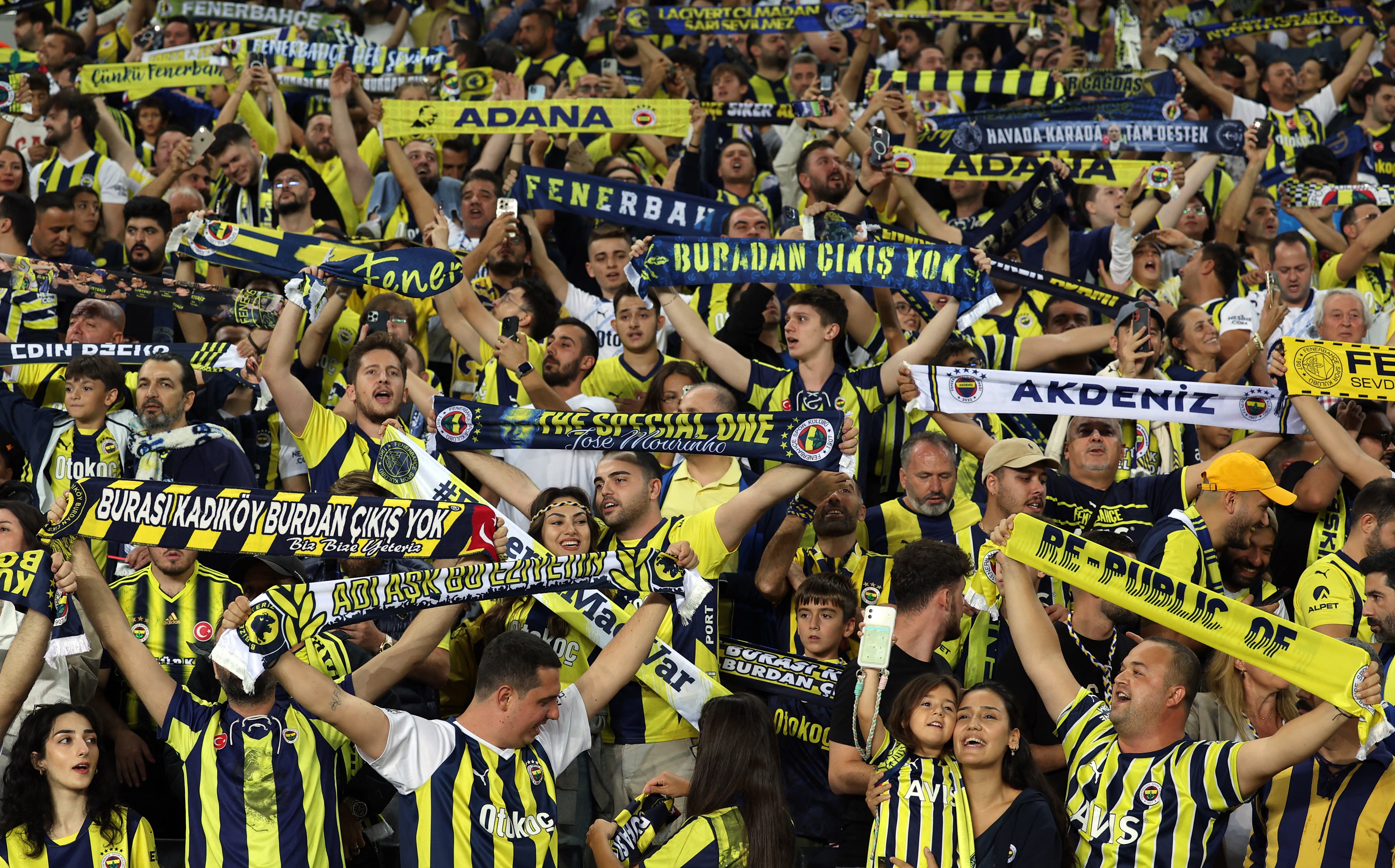 Fenerbahce fans react before the match