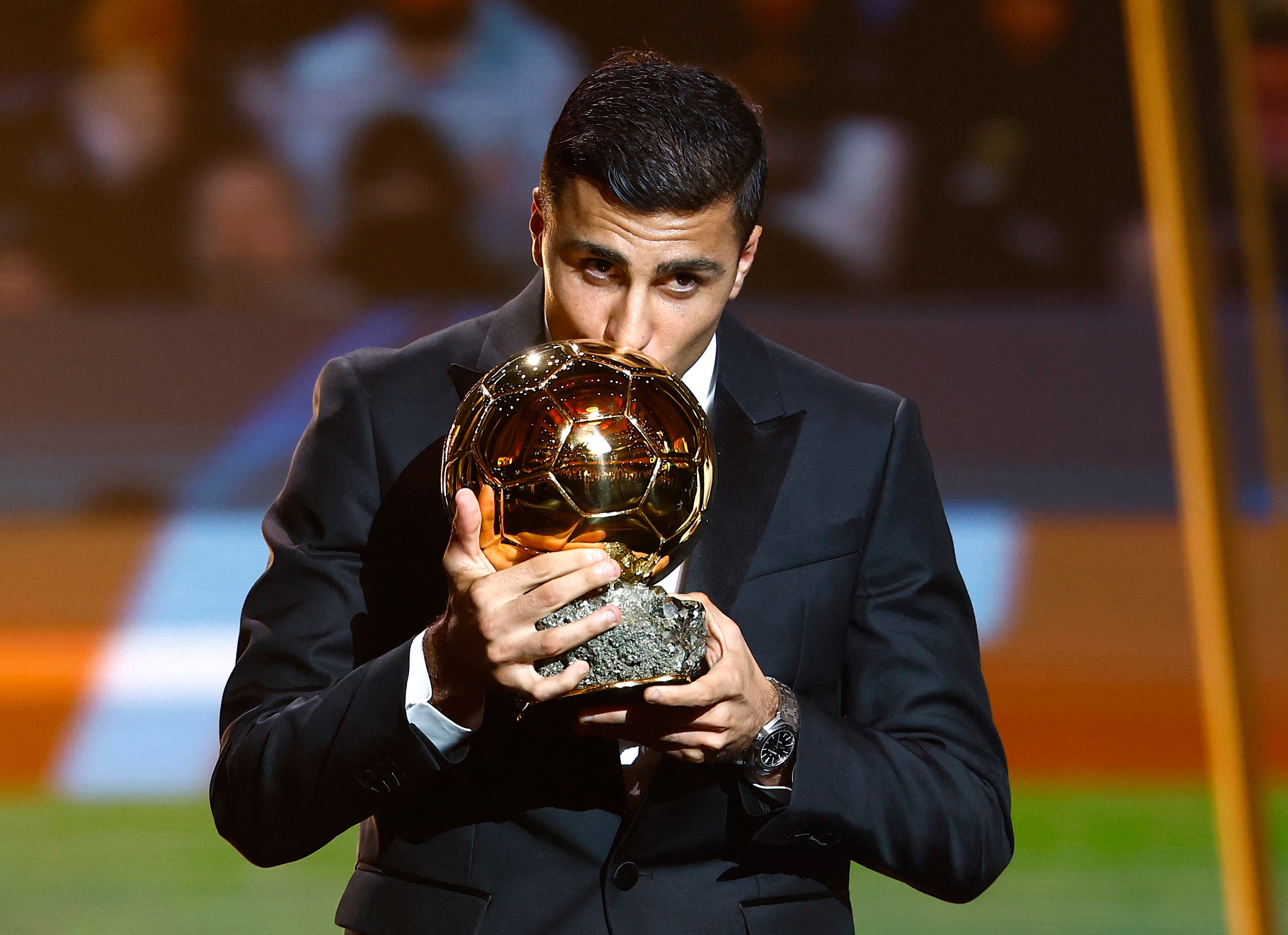 Rodri receiving the 2024 Ballon d'Or award.