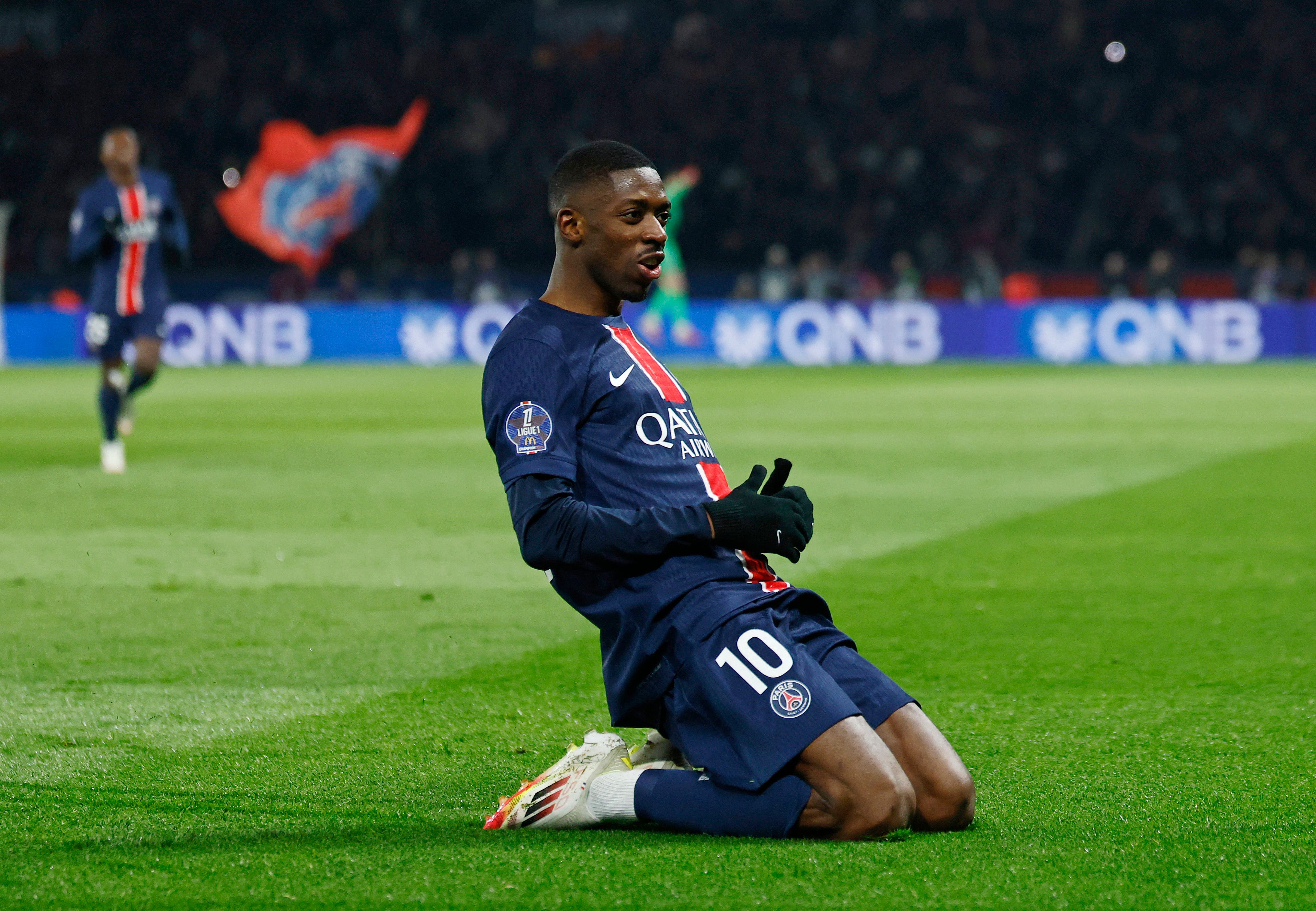 Paris St Germain's Ousmane Dembele celebrates scoring their first goal 