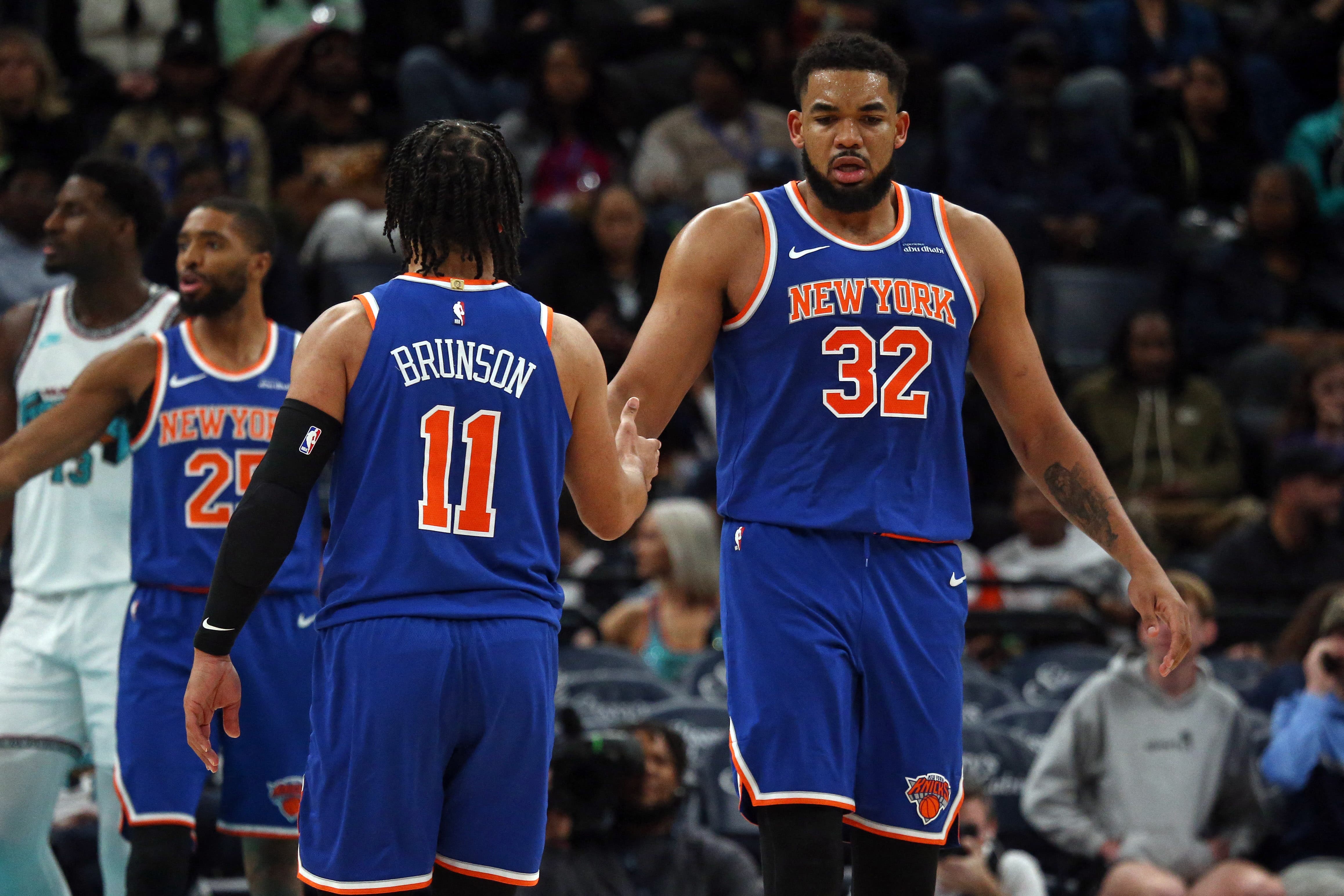 New York Knicks' Jalen Brunson and Karl-Anthony Towns against the Memphis Grizzlies in the 2025 NBA regular season.