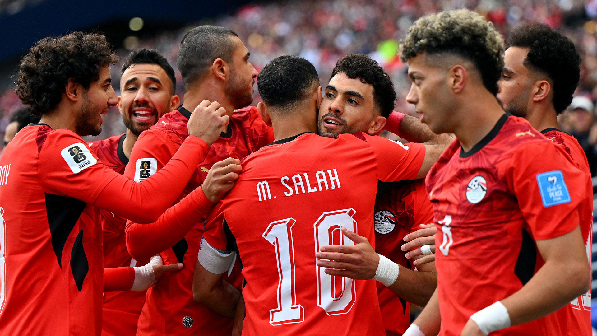 Soccer Football - FIFA World Cup 2026 - Group G - Egypt v Iran - Seattle Stadium, Seattle, Washington, U.S. - June 26, 2026 Egypt's Mahmoud Saber celebrates scoring their first goal with Mohamed Salah and teammates IMAGN IMAGES via Reuters/Steven Bisig