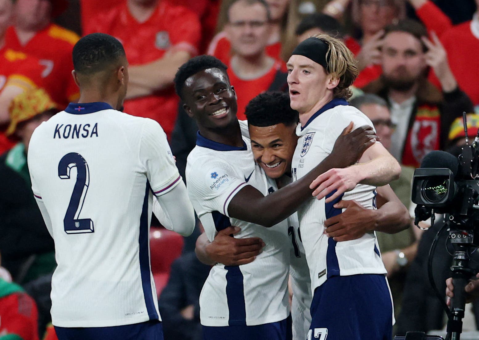 Soccer Football - International Friendly - England v Wales - Wembley Stadium, London, Britain - October 9, 2025 England's Ollie Watkins celebrates scoring their second goal with Bukayo Saka, Anthony Gordon and Ezri Konsa REUTERS/Hannah Mckay