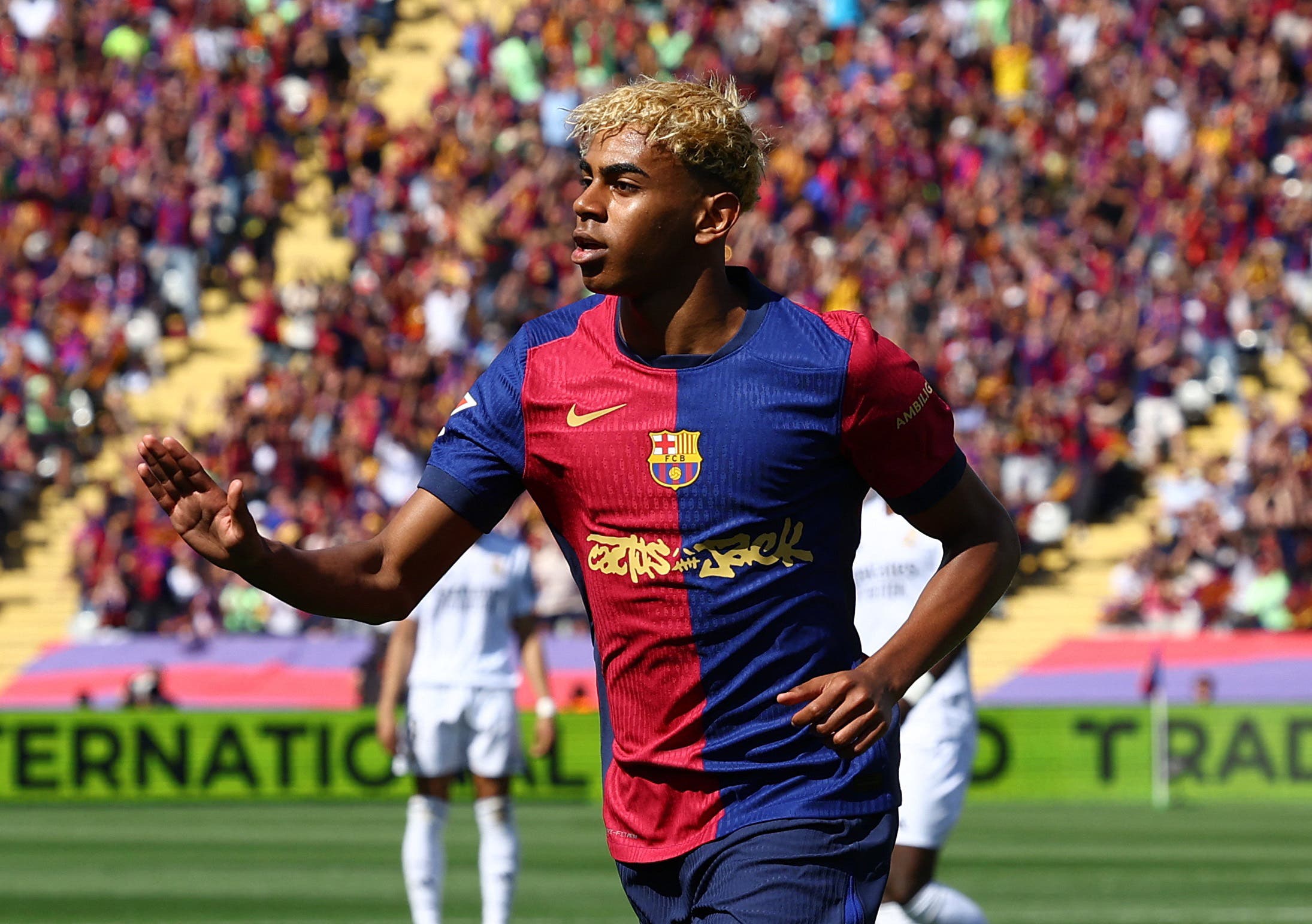 FC Barcelona's Lamine Yamal celebrates scoring their second goal