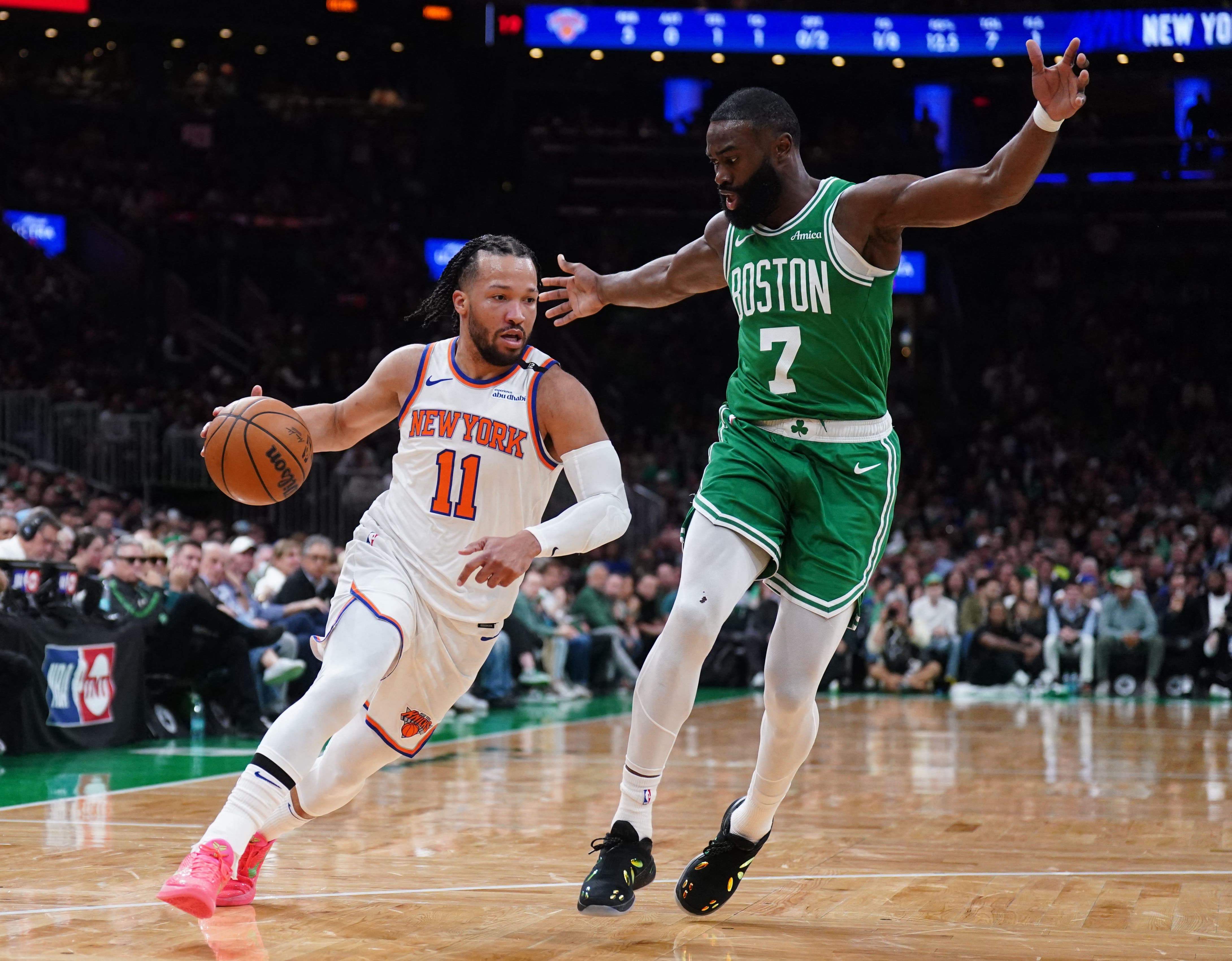 New York Knicks' Jalen Brunson and Boston Celtics' Jaylen Brown playing during Game 5.