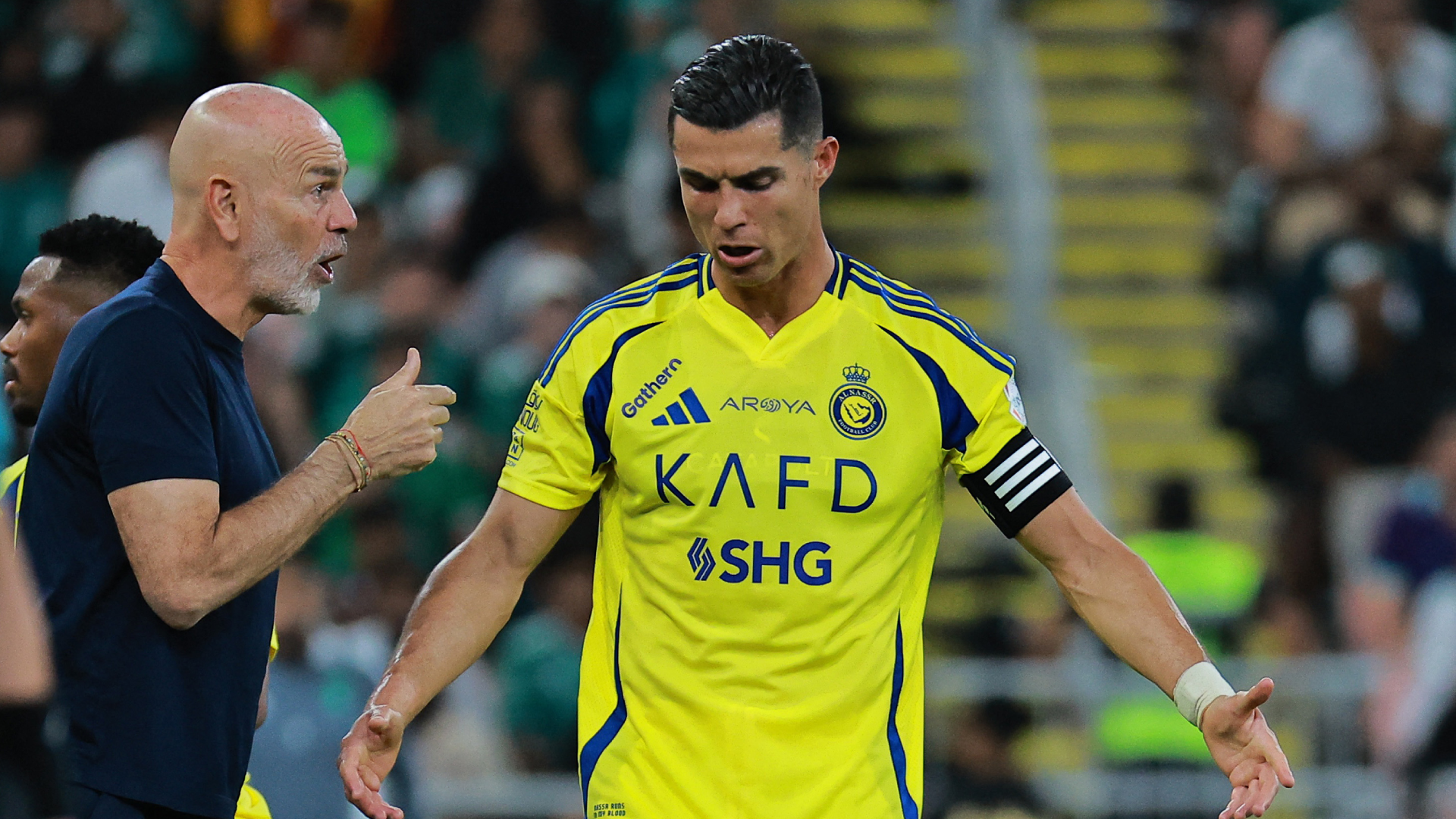 Cristiano Ronaldo and Stefano Pioli during an Al-Nassr match.