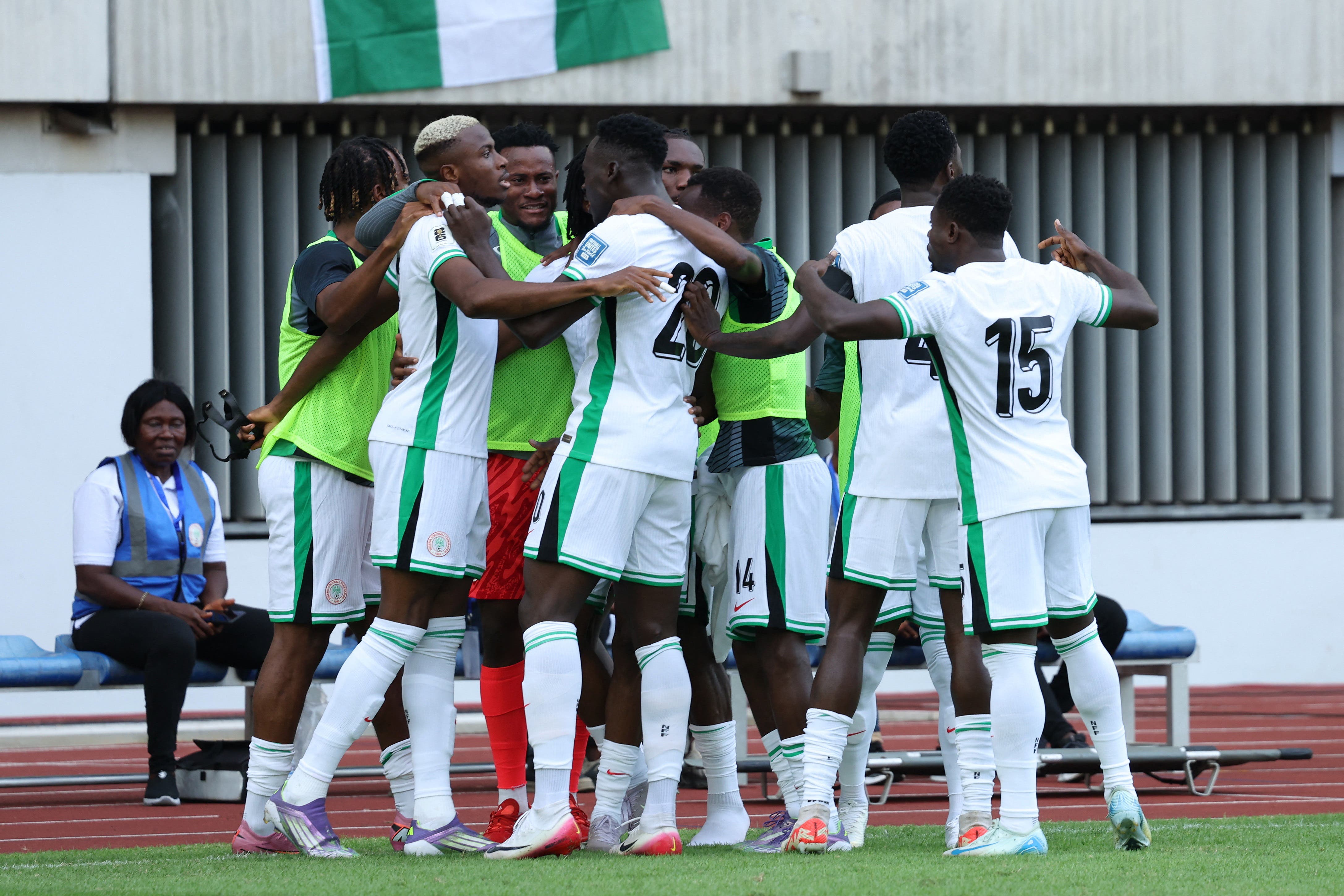 Soccer Football - FIFA World Cup - CAF Qualifiers - Group C - Nigeria v Benin - Godswill Akpabio International Stadium, Uyo, Nigeria - October 14, 2025 Nigeria's Victor Osimhen celebrates scoring their first goal with teammates REUTERS/Sodiq Adelakun